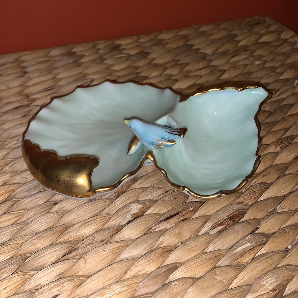 Vintage pale blue porcelain trinket dish with bird and gold overlay